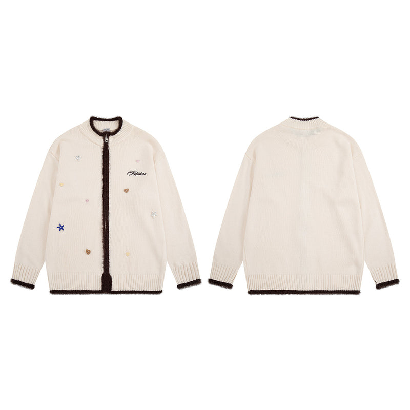 Gilet en maille zippé avec ornements cœur et étoile