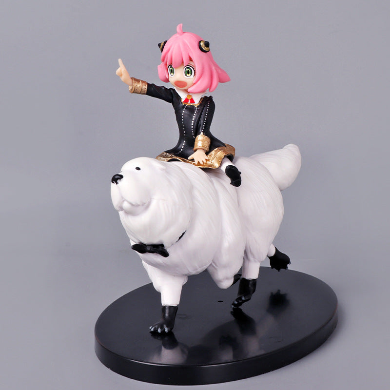 The Spy x Family Anya Forger PVC Figure features a 17 cm collectible Anya with pink hair and a black outfit, triumphantly raising an arm atop a white polar bear. The figure stands on a sleek black circular base, making it a must-have for any fan of Spy × Family.