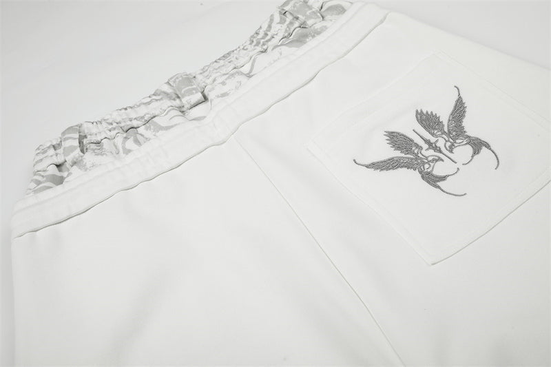 Pantalon de survêtement large avec motif « YOU » en strass et double ceinture – Blanc