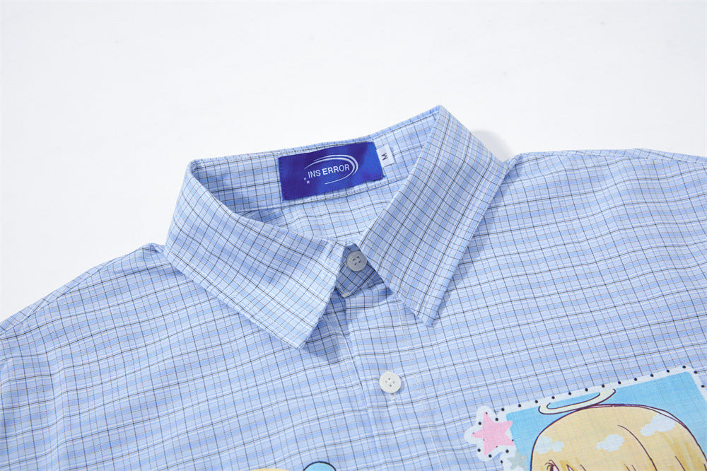 Blue plaid button-up collar and chest logo tag close-up