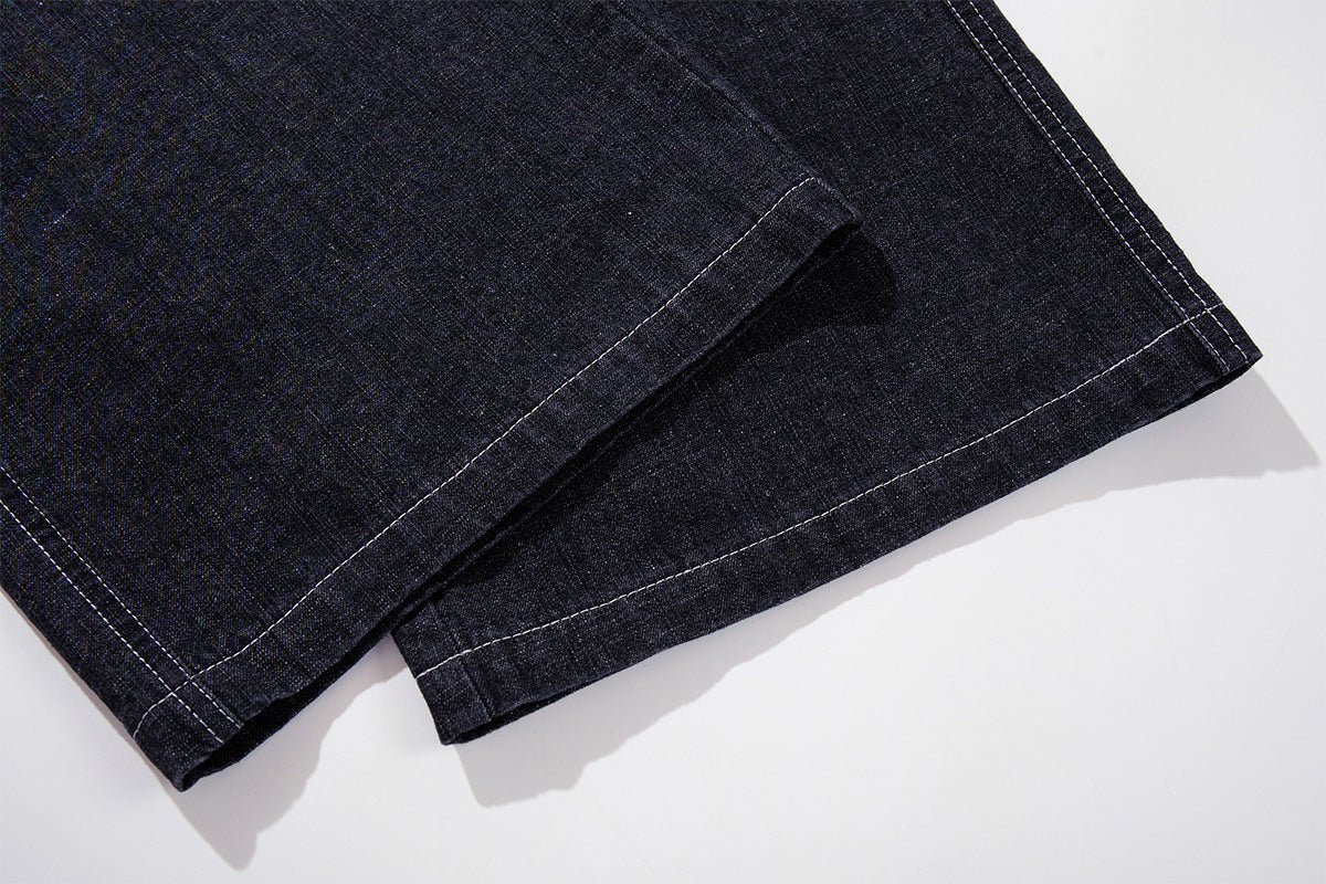 Vaqueros baggy de pierna ancha, lavado oscuro, bragueta diagonal de botones y denim crudo