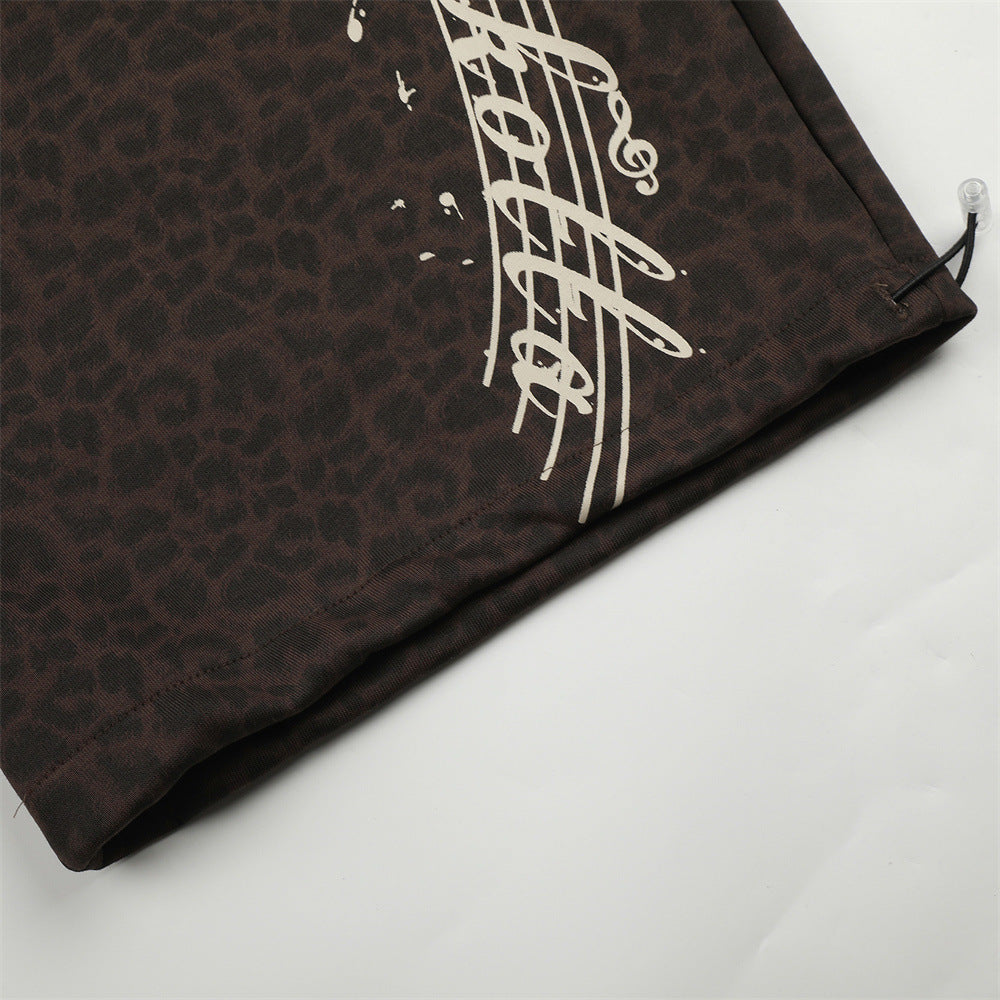 Wide-Leg Sweatpants with Side Stripes & Music Note Print