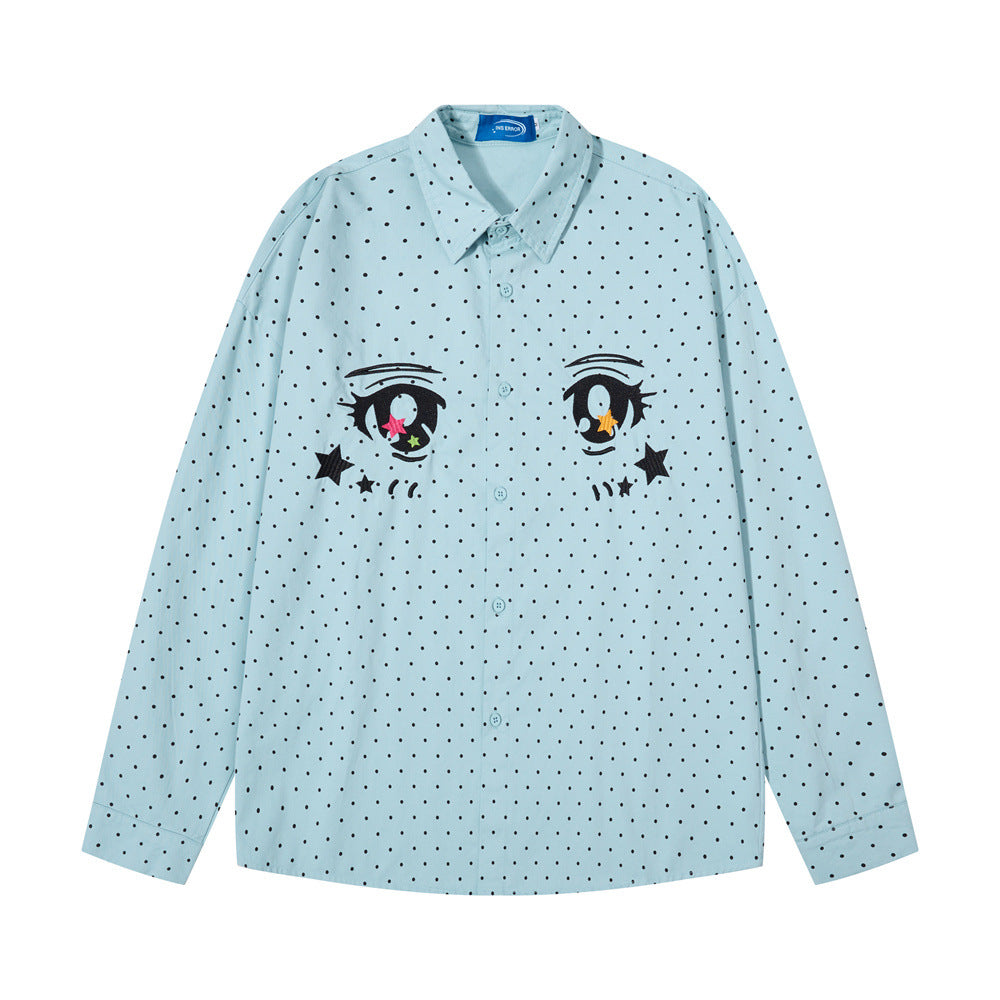 Front view of a light blue long sleeve button-down shirt with anime eyes and black polka dots