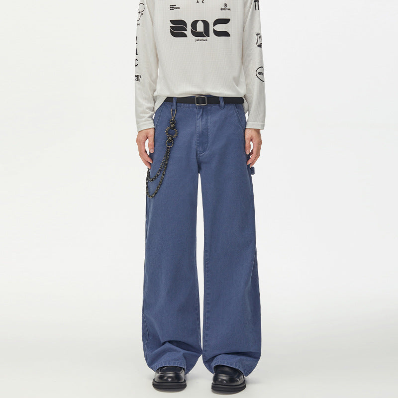 Weit geschnittene Vintage-Workwear-Hose für Herren in verwaschenem Blau mit Metallkettendetail und gerade-relaxter Passform