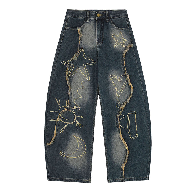 Unisex baggy wide-leg jeans in vintage blue with gold celestial embroidery and raw-edge frayed seam panel on front