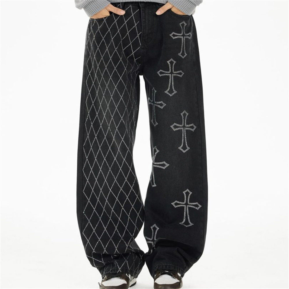Black wide-leg jeans with argyle panel and rhinestone cross graphics on the front