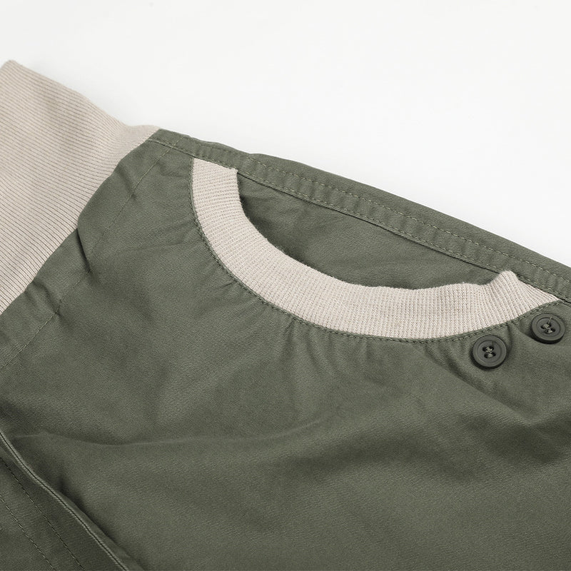 Pantalon palazzo à jambes larges – Taille haute, braguette à boutons, ceinture côtelée et ourlet brut