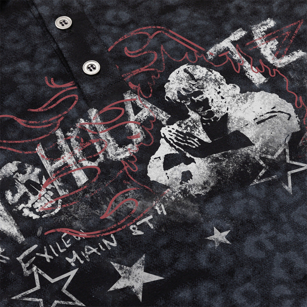 Detailed view of the polo chest graphic with red lettering, monochrome figures, and star motifs