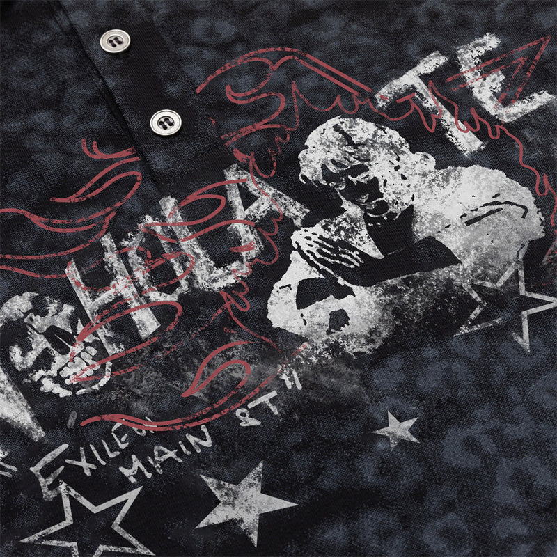 Detailed view of the polo chest graphic with red lettering, monochrome figures, and star motifs
