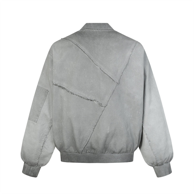Blouson bomber déconstruit en patchwork – Toile délavée et coutures brutes