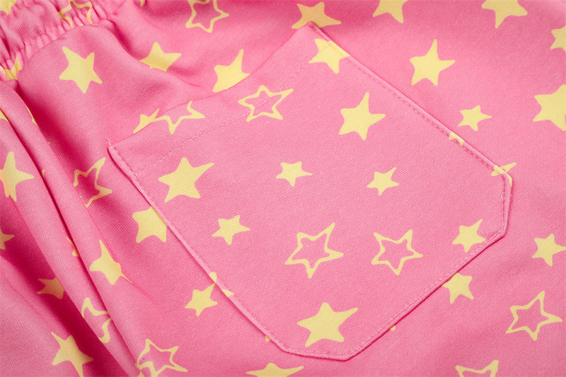 Close-up of pink star print sweatpants rear pocket with star pattern