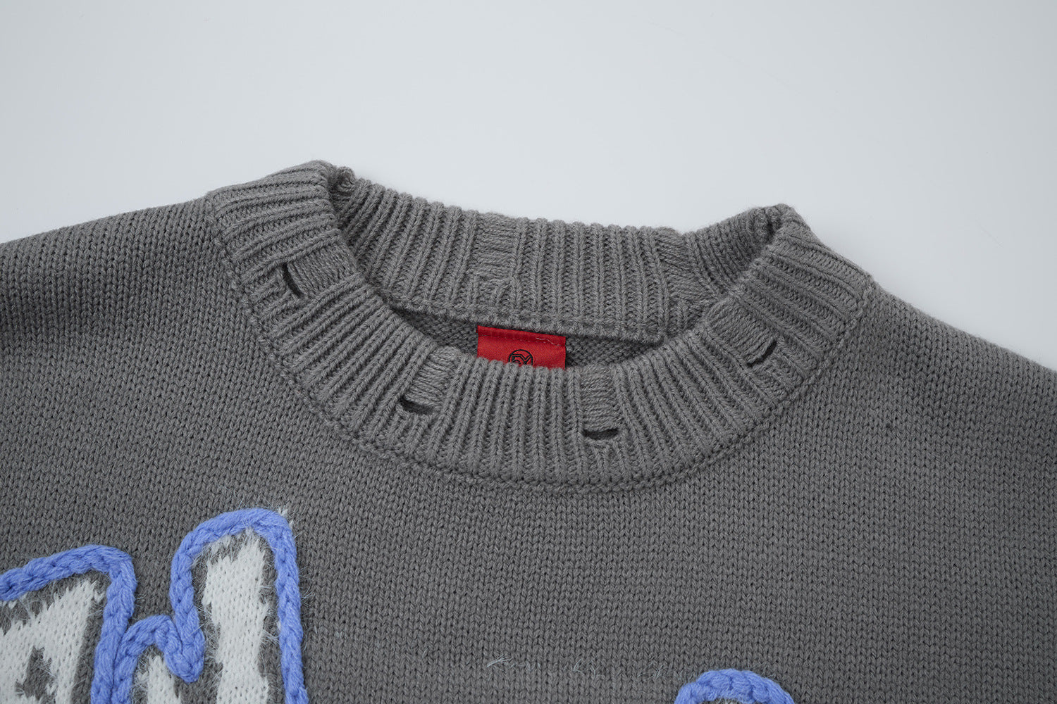Pull en maille à lettres graffiti Wild Soul – Col rond oversize, style vintage américain