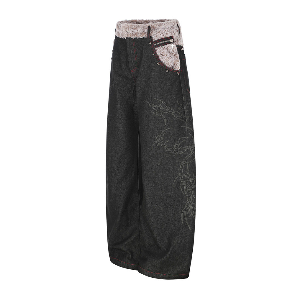 Schwarze Wide-Leg-Jeans mit Kunstfell-Kontrastbund und Nieten-Details