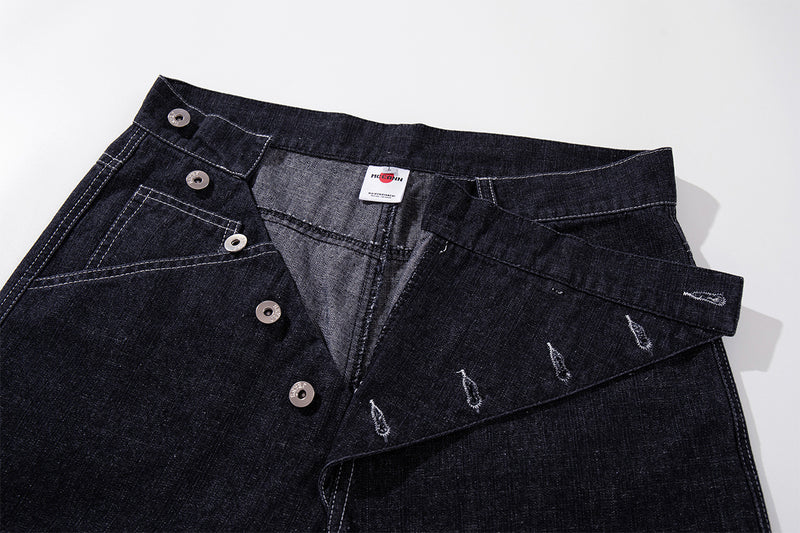 Vaqueros baggy de pierna ancha, lavado oscuro, bragueta diagonal de botones y denim crudo
