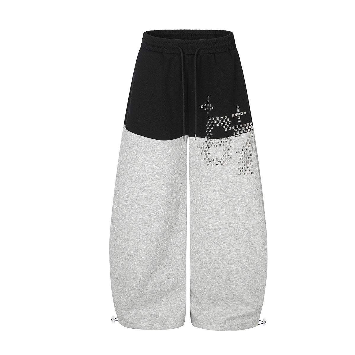 Gerade geschnittene Sweatpants – Colorblock-Baggy-Jogger mit Nieten-Grafik