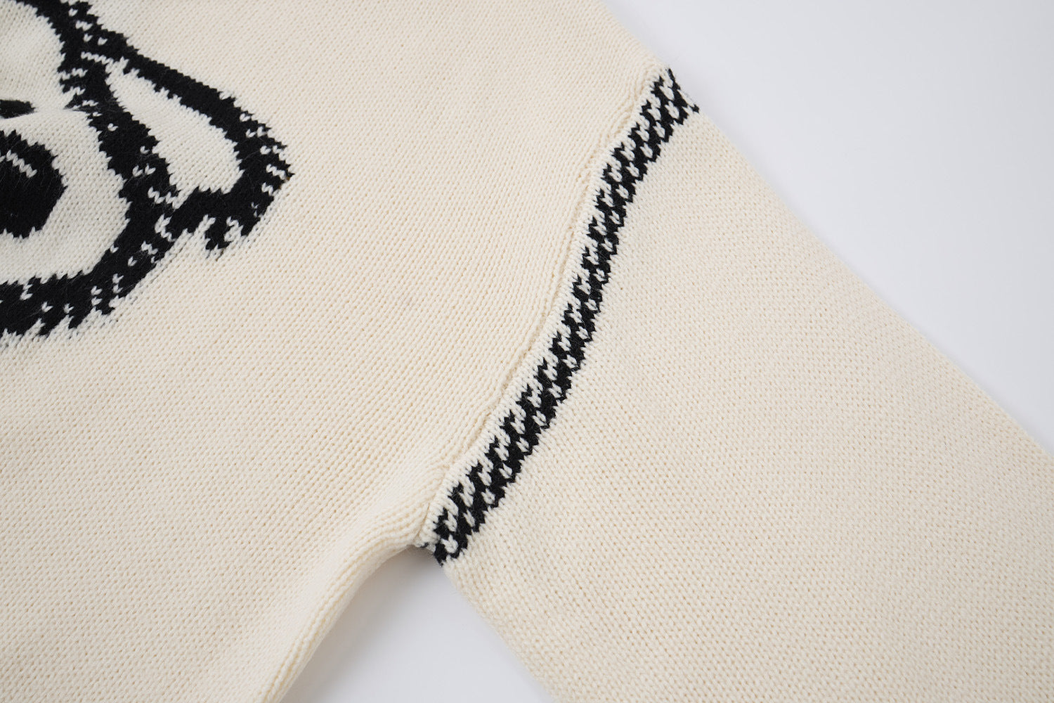 Pull à capuche oversize en maille jacquard avec grand motif graphique sur le devant