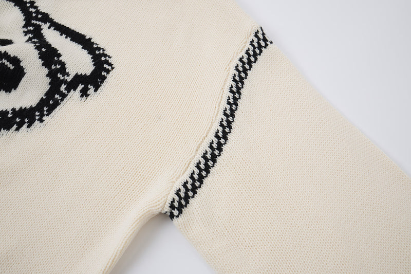 Pull à capuche oversize en maille jacquard avec grand motif graphique sur le devant