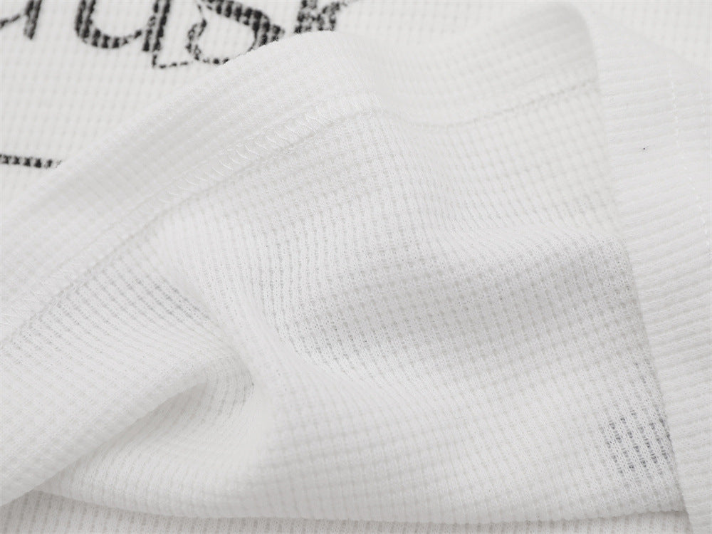 Herren-Langarmshirt mit Grafik – Oversize-Streetwear-Shirt aus Waffelstrick mit Schriftprint