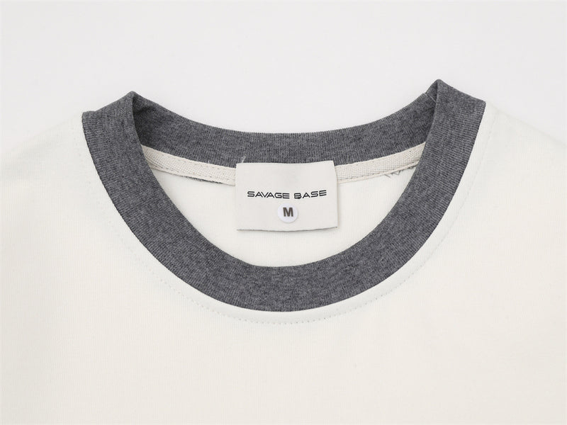 Camiseta de manga larga para hombre con bloques de color y bordado de texto – Corte relajado
