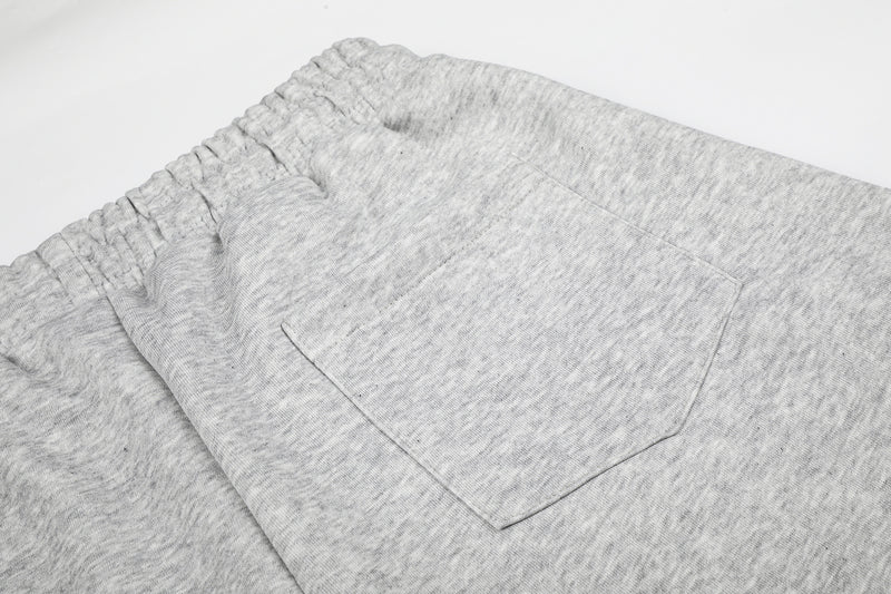 Pantalon de survêtement à jambes larges avec rayures rétro et imprimé graphique
