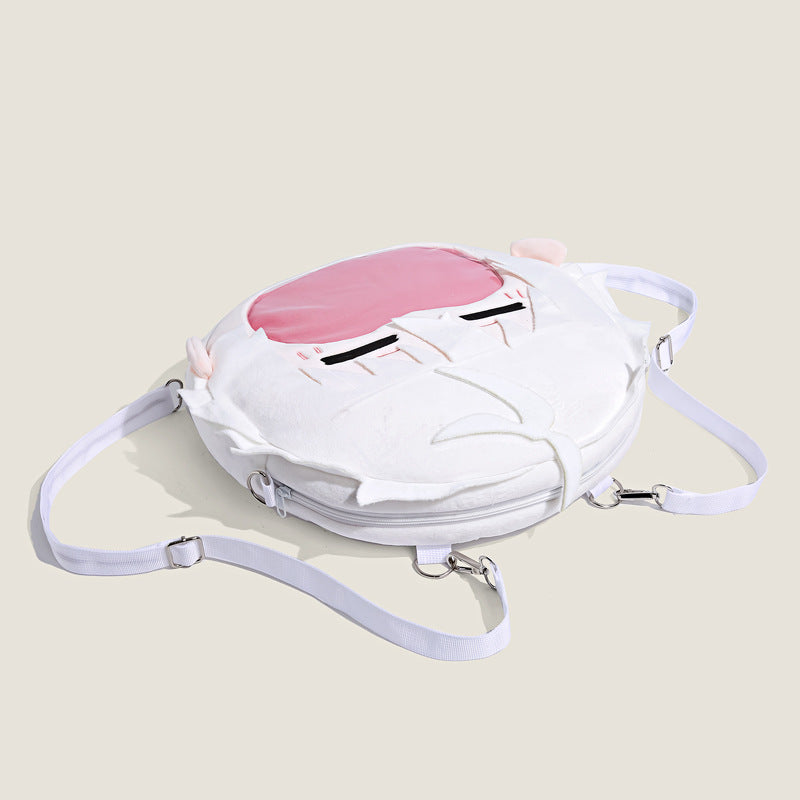 The Seakoff Blue Lock Seishiro Nagi Plush Shoulder Bag is a charming white round bag featuring a cartoon face with pink hair and closed eyes, adjustable white straps, and a transparent mouth pocket, perfect for adding a quirky touch to your collection.