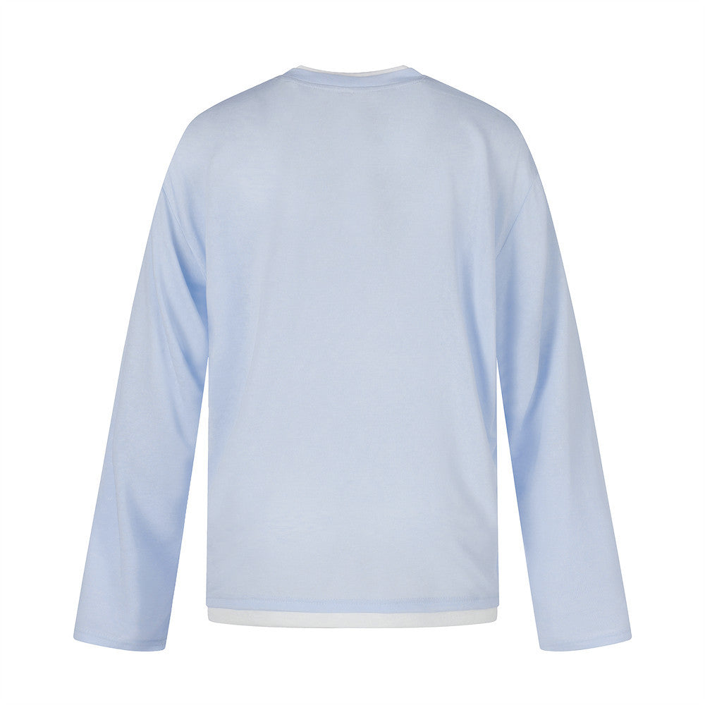 Plain light blue long sleeve tee shown from the back with gray neckline trim