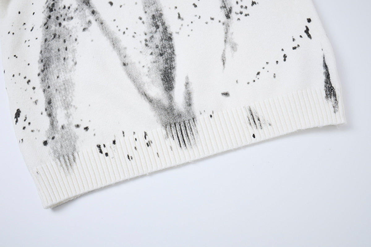 Pull en maille col rond éclaboussures d’encre – Motif peinture déstructuré