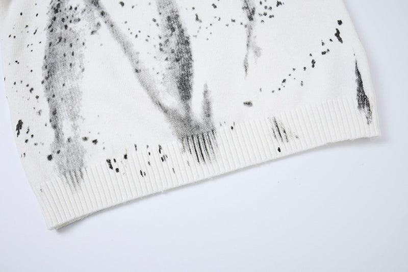 Pull en maille col rond éclaboussures d’encre – Motif peinture déstructuré