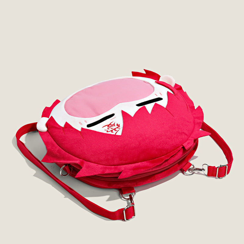 The Seakoff Naruto Gaara Character Plush Shoulder Bag features a round, red design with white and pink accents, including cartoonish ears and sunglasses. It has a transparent mouth pocket, side zipper opening, and comes with two detachable red straps.