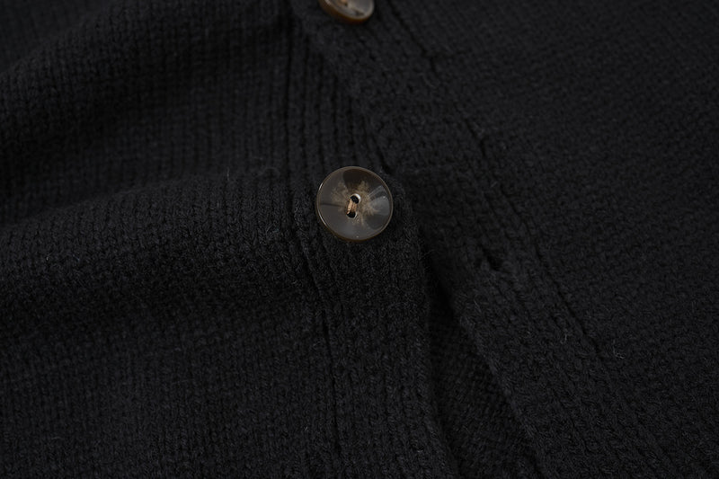 Cardigan en maille déstructurée à col tartan superposé