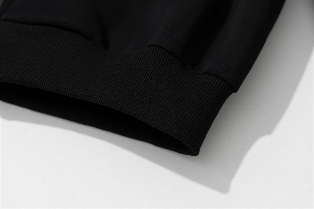 Sweat à capuche noir zippé avec col en fausse fourrure et détails cloutés métalliques