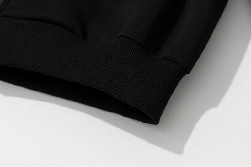 Sweat à capuche noir zippé avec col en fausse fourrure et détails cloutés métalliques