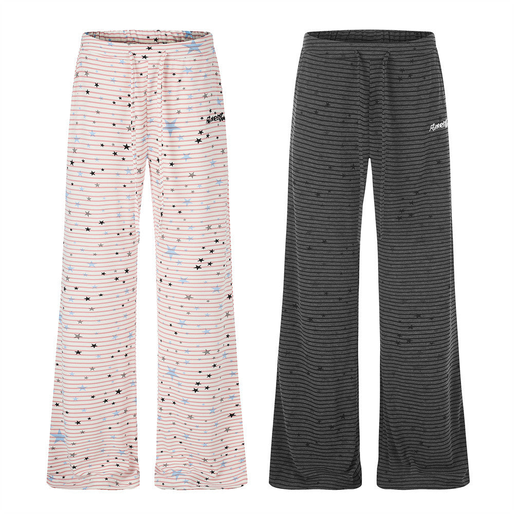 Women's wide-leg star and stripe lounge pants in pink and charcoal grey with flared hem and drawstring waist