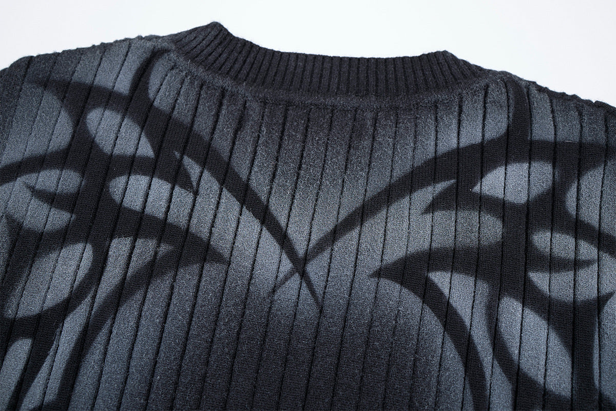 Pull côtelé à col rond avec imprimé graffiti tribal