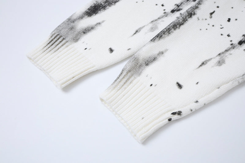 Pull en maille col rond éclaboussures d’encre – Motif peinture déstructuré
