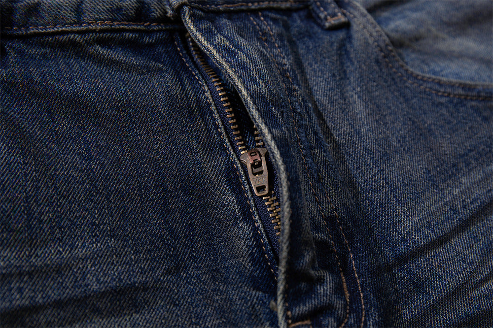 Wide-Leg Ripped Jeans – Vintage Washed Distressed Denim with Studded Patches