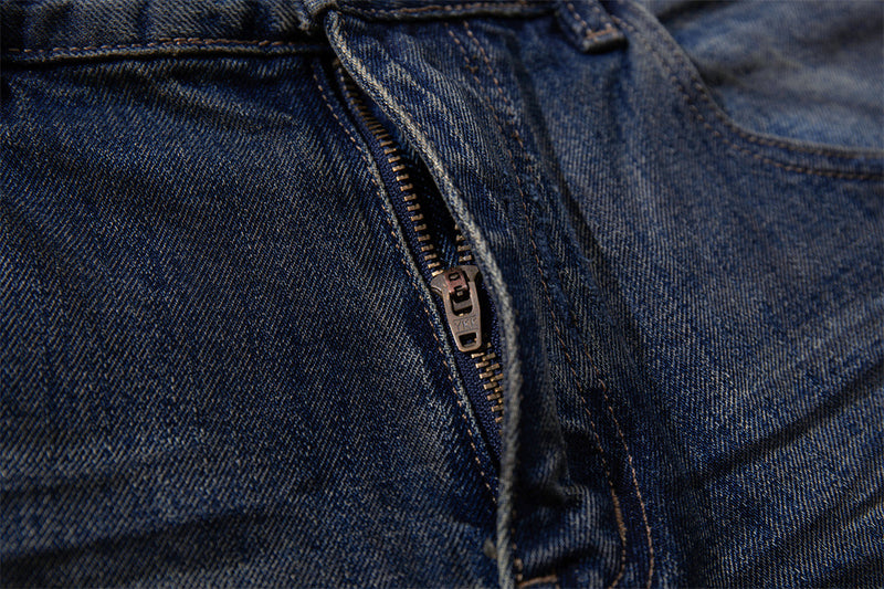Wide-Leg Ripped Jeans – Vintage Washed Distressed Denim with Studded Patches