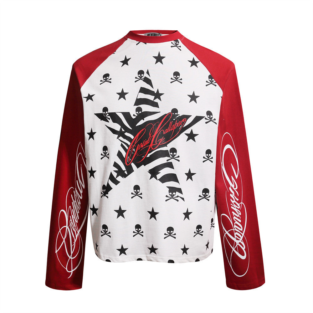 White raglan long-sleeve tee with all-over skull and star print, large zebra-stripe star chest graphic, and contrasting red s