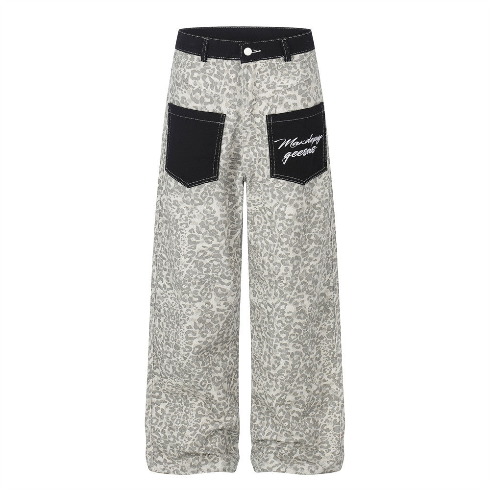 Men's grey leopard print wide-leg cargo pants with black contrast pockets and embroidered script branding, front view