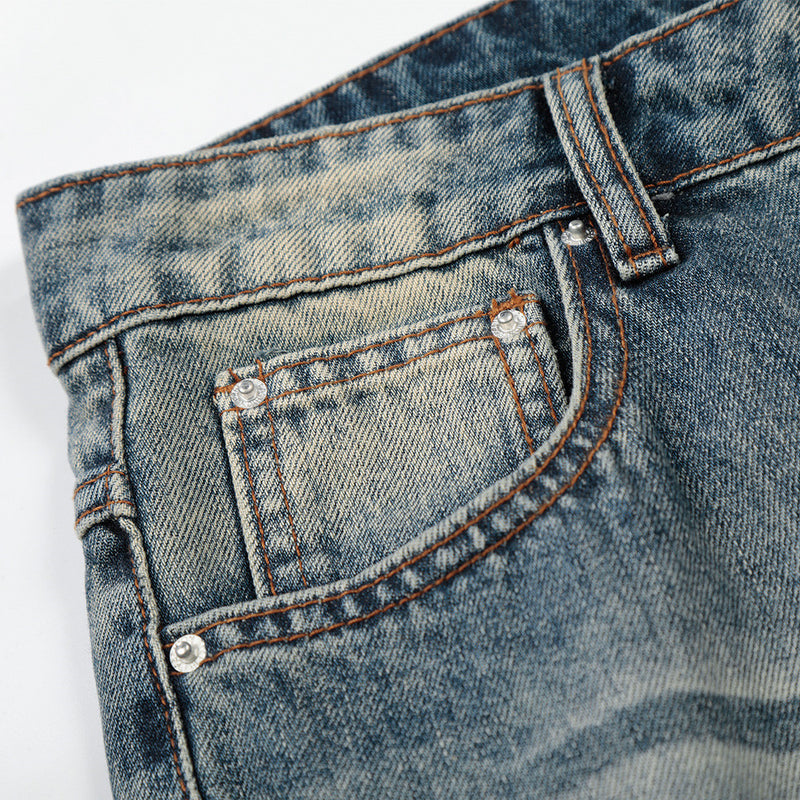 Vintage Washed Wide-Leg Flare Jeans – Distressed Faded Denim with Crease Detail