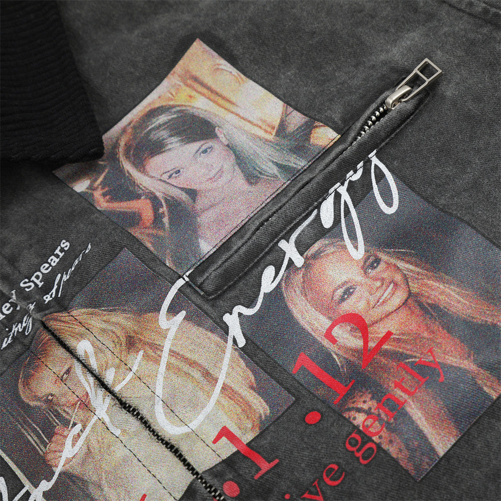 Close-up of black jacket graphic print showing portrait panels and red text on chest