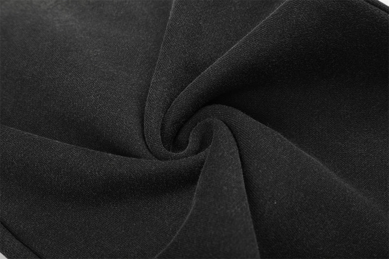 Pantalon de survêtement ample à œillets métalliques, finition délavée à l’acide & ourlet brut