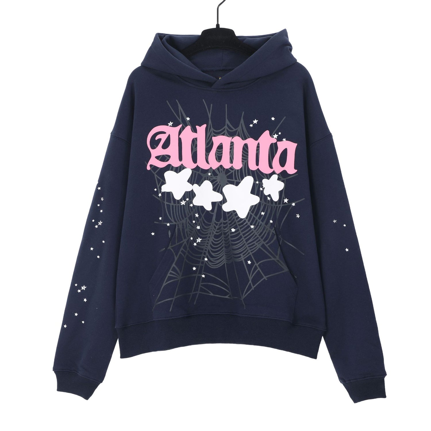 The Stylish Navy Atlanta Sp5der Hoodie by Sp5der is a trendy streetwear piece featuring &quot;Alana&quot; in pink block letters over a web graphic with four white stars, adorned with small white dots across the sleeves and torso, delivering the allure of a classic Sp5der design.