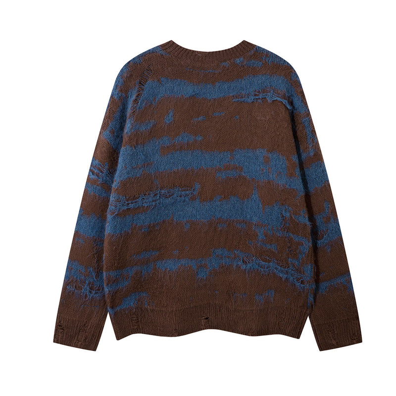Back view of a brown and blue distressed stripe jacquard knit sweater with an oversized shape