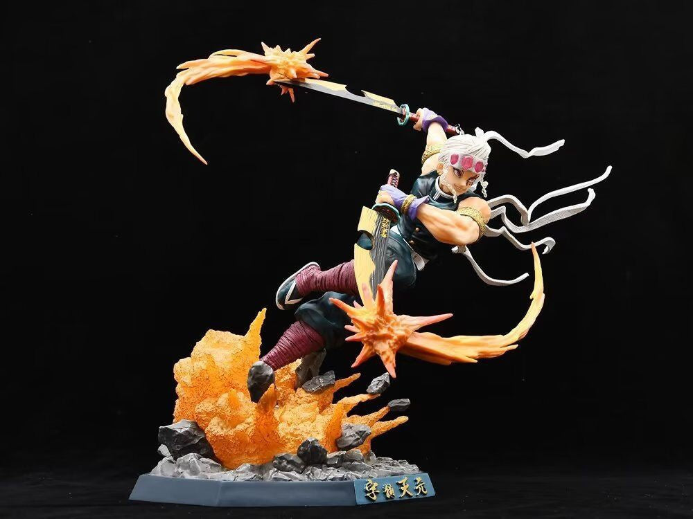 The Seakoff Premium Demon Slayer Urogi Figure (37cm) captures an armored character with white hair, dual-wielding fiery swords mid-action. The detailed GK model stands on a rocky base featuring USB light-up effects and Asian characters for added drama.