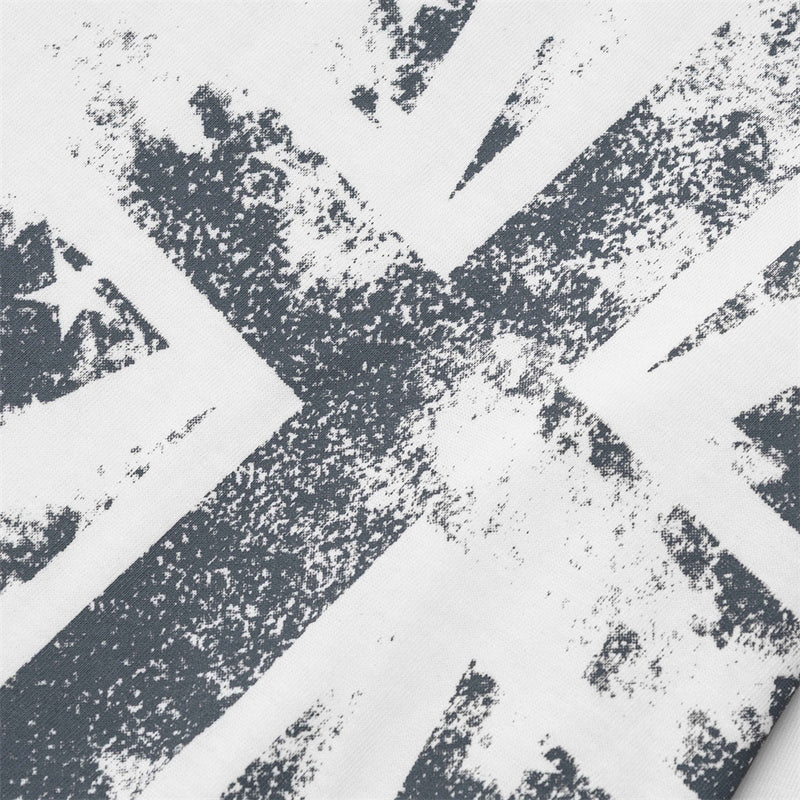 Close-up of distressed Union Jack print on white fabric