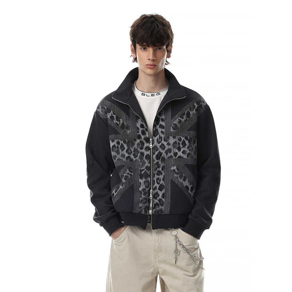 Men's oversized zip-up track jacket with Union Jack leopard print graphic in charcoal grey, worn with cream trousers