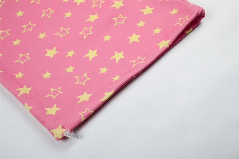 Close-up of pink star print sweatpants hem with elastic toggle detail