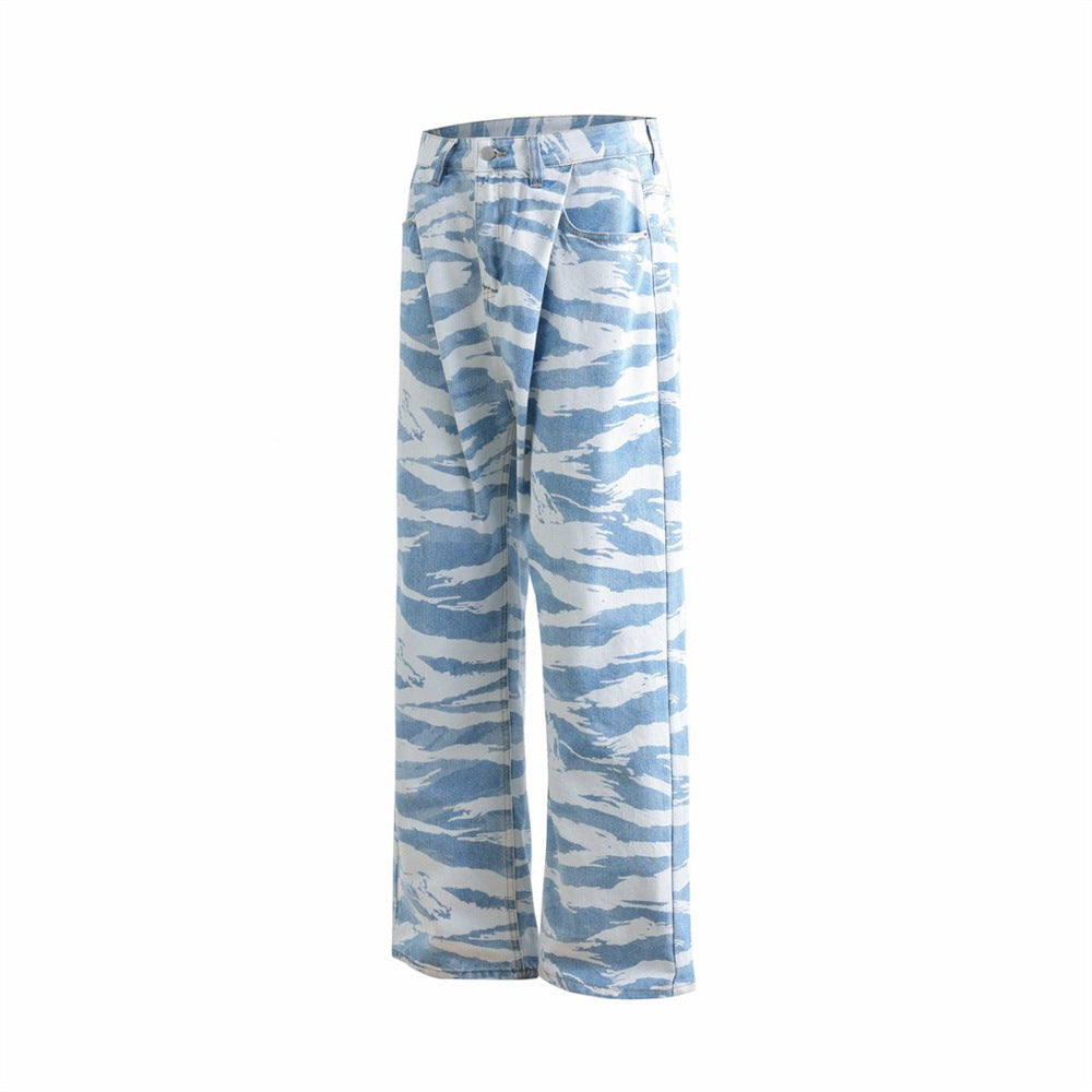 Side view of wide-leg light blue jeans with white zebra camo pattern