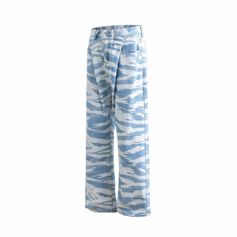 Side view of wide-leg light blue jeans with white zebra camo pattern